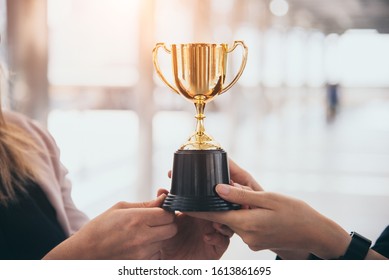 Champion golden trophy for winner background. Success and achievement concept. Sport and cup award theme. Best business entrepreneur and startup award and prize. First place on final competition - Powered by Shutterstock