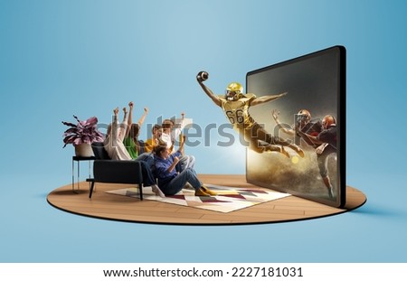 Champion. Presence effect. Astonished thrilled youth, girls and boys sitting in front of huge 3D model of TV screen at home interior and watching online broadcast of american football match