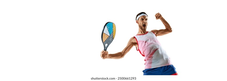 Champion. Young man, tennis player in uniform with colorful padel racket showing his motivation and ambitions, winning emotions isolated on white background. Sport, hobby, games, competition concept - Powered by Shutterstock