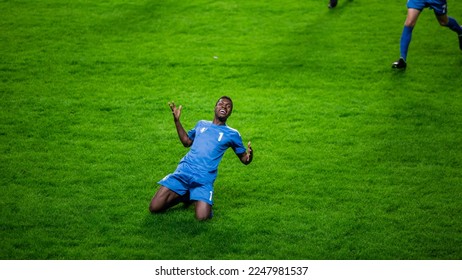 Championship Match: Blue Soccer Football Team Attack, Player Run Happy after Scoring Goal, Celebrate Victory, Slide on Knees. Sport Channel Broadcast Television Concept. - Powered by Shutterstock