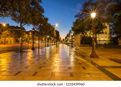 Champs Elysees In Paris At Night.