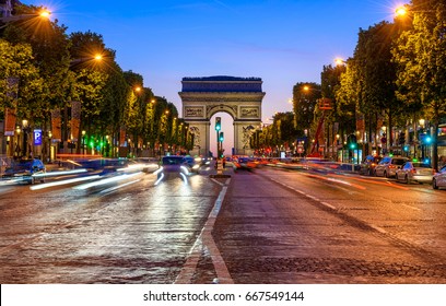 Champs-Elysees and Arc de Triomphe at night in Paris, France. Architecture and landmarks of Paris. Night cityscape of Paris
