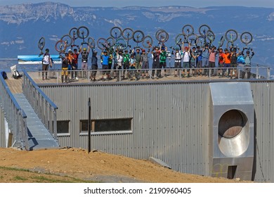 CHAMROUSSE, FRANCE, August 1, 2022 : Unicycle Enthusiasts Pose For A Group Picture At The Belvedère Overlooking The City Of Grenoble.