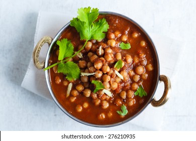 Chana Masala - Spicy Chickpea Curry , Indian Dish
Chickpeas soaking in a bed of Onion Tomato gravy, garnished with Coriander leaves and Ginger Juliennes