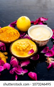 Chana,haldi,limbo & Milk  Ka Ubtan Or Ayurvedic Face Pack Of Turmeric, Lemon,gram Flour & Milk On Wooden Surface For Good Skin And No Black Heads Or Any Skin Related Problems.