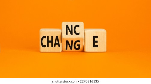 Chance and change symbol. Concept word Chance Change on wooden cubes. Beautiful orange table orange background. Business and chance and change concept. Copy space.