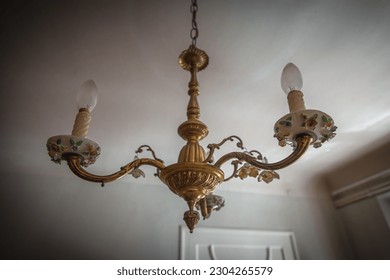 Chandelier floral antique. Sculpture and relief inspired in floral patterns.  - Powered by Shutterstock