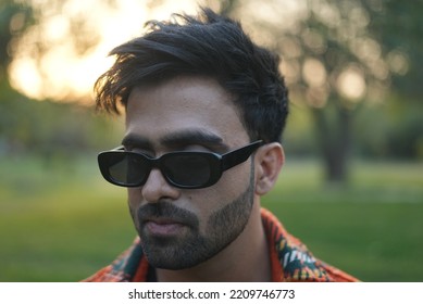 Chandigarh, Chandigarh India - 10 04 2022 : A Man Wearing Orange Jacket Posing In Park