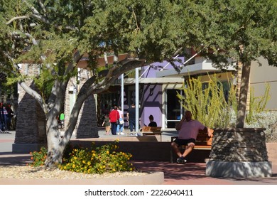 Chandler, Arizona - November 07 2022: Shoppers Walking And Sitting At The Phoenix Premium Outlets Outdoor Mall.