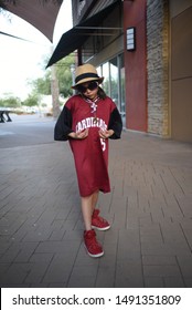 Chandler AZ/ 06/29/2019 Girl Posing For Photo In Arizona  Cardinals  Jersey, Football NFL Fan 