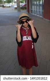 Chandler AZ/ 06/29/2019 Girl Posing For Photo In Arizona  Cardinals  Jersey, Football NFL Fan 