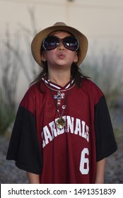 Chandler AZ/ 06/29/2019 Girl Posing For Photo In Arizona  Cardinals  Jersey, Football NFL Fan 