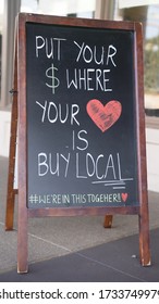 Chandler,Az/USA - 5.16.20: Shoethrill Is
A Locally Owned European Comfort Shoe Store Opened In 2012.  A Hand Drawn Buy Local Chalk Board Sign Outside The Store Reminds Locals To Show Their Love.
