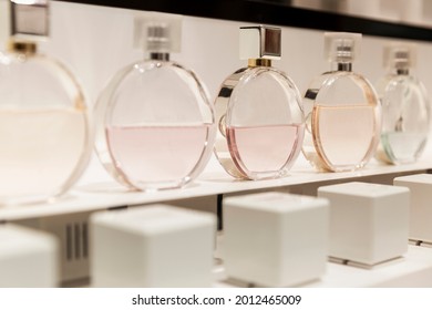 Chanel perfume bottles on the counter. Elegance and style. Close-up.