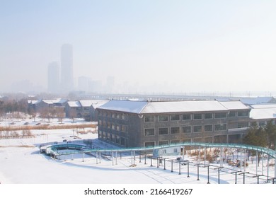 Changchun, Jilin - June 3 2021: Building And A Glass Walkway In Winter.