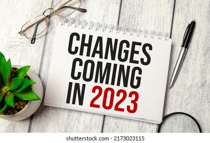 change is coming in 2023 word on notebook and calculator - Shutterstock ID 2173023115