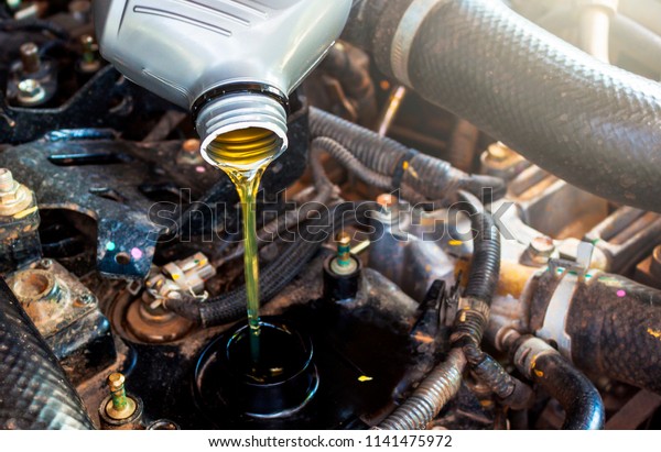 Change the\
Engine oil car, selective focus to\
oil