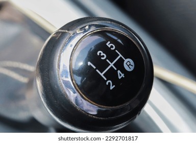 Change gears in manual cars which have 5 speed transitions - Shutterstock ID 2292701817