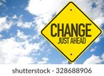 Change Just Ahead sign with sky background