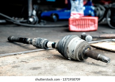 Change The New Drive Shaft In The Car.