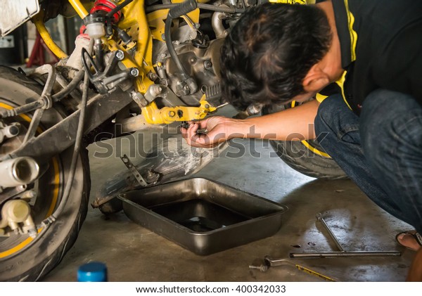 Change Oil Motorcycle Stock Photo (Edit Now) 400342033