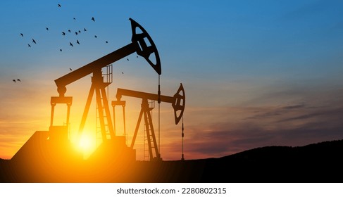 The change in oil prices caused by the war. Oil price cap concept. Oil drilling derricks at desert oilfield. Crude oil production from the ground. Petroleum production.