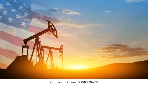 The change in oil prices caused by the war. Oil price cap concept. Oil drilling derricks at desert oilfield with USA flag. Crude oil production from the ground. Petroleum production. - Powered by Shutterstock