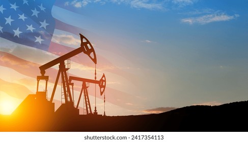 The change in oil prices caused by the war. Oil price cap concept. Oil drilling derricks at desert oilfield with USA flag. Crude oil production from the ground. Petroleum production. - Powered by Shutterstock