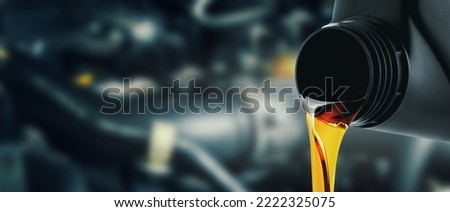 change and pour new car engine oil into the motor. banner with copy space