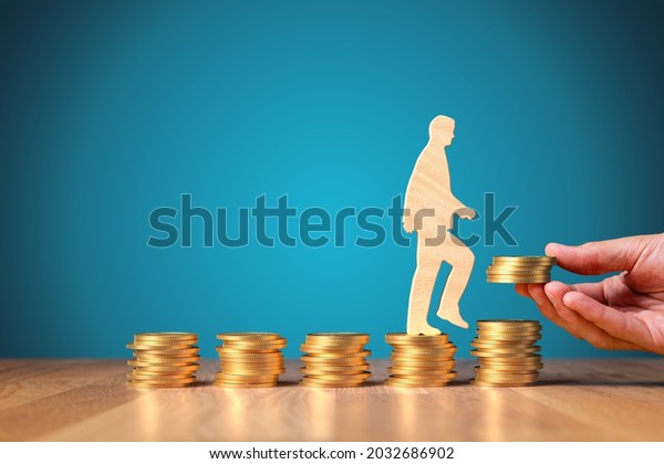 Change return on\
investment, growing savings or wage income concept. Wooden person\
is going from constant bucket of coins to growing coins. Successful\
investment concept.