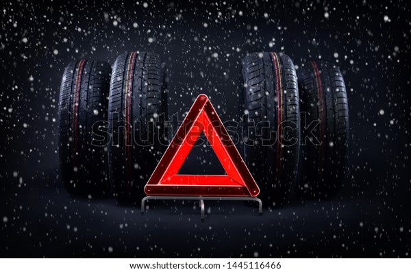 Change\
tires for winter advice with summer tires, snow and red emergency\
stop sign. Time to switch your tires background.\
