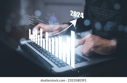 Changes in new planning, Hand using laptop with number 2024 new year, start new year concept digital trends,industry and business trend, strategy, investment, business planning and happy new year  - Powered by Shutterstock - Get 15% off with code: PIKWIZARD15