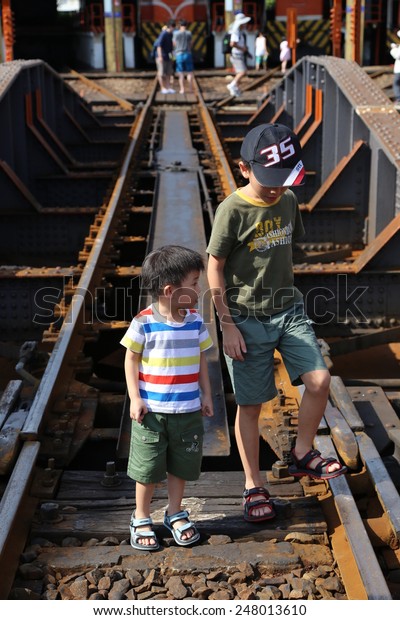 Changhua, Taiwan - August 30,\
2013:Children play and tourists taking pictures in a circular\
station