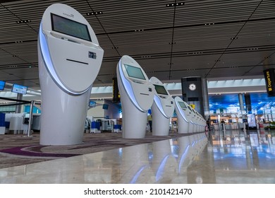 Changi Airport, Singapore - march 30, 2019 : Self-service check-in facilities at Terminal 1, Changi Airport. Changi Airport is a major civilian airport that serves Singapore