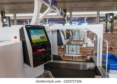 Changi Airport, Singapore - march 30, 2019 : Self-service check-in facilities at Terminal 1, Changi Airport. Changi Airport is a major civilian airport that serves Singapore