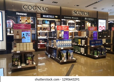 CHANGI, SINGAPORE - APR 22, 2018: Interior view of Wines and Spirits store at Changi Airport Terminal 2 arrival hall. Changi Airport is one of the largest transportation hubs in Southeast Asia.