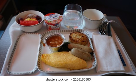 Changi, Singapore - July 2022: A Business Class Meal Served By Singapore Airlines.