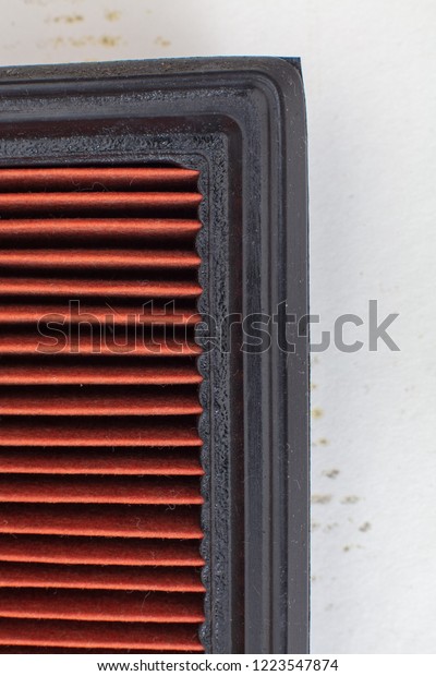 Changing an air filter\
. Detail, texture, Dirty, clogged air filter surface . General auto\
maintenance concept