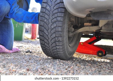 Changing Car Tire. Taking Care Of Your Car. Changing Summer Tires At Home.