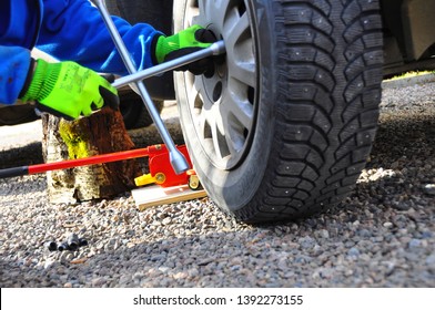 Changing Car Tire. Taking Care Of Your Car. Changing Summer Tires At Home.