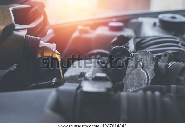 Changing engine oil in a\
car