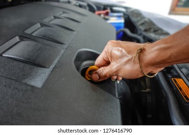 Changing the engine oil for car care