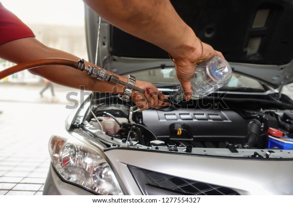 Changing the engine oil for\
car care