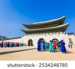 Changing of the Guard at Gwanghwamun Gate, Seoul (translation: the frame in the top center reads "Gwanghwamun")