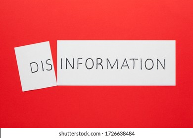 Changing the word disinformation to information on a white sheet