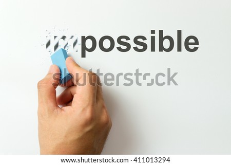 Changing the word impossible to possible with a eraser