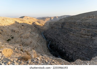 The channel of the Kidron stream in the Judean desert - Shutterstock ID 2255986193