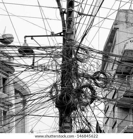 The chaos of cables and wires in Kathmandu - Nepal (black and white)