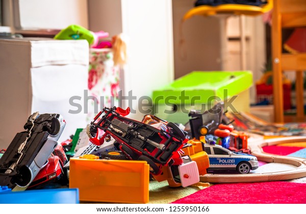 Chaos in the\
colorful children\'s room - Toy\
cars
