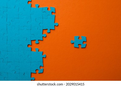 From Chaos To Order, Concept. The Puzzle Element Moves Towards The Correctly Assembled Puzzle. A New Employee In An Already Formed Work Team, Hiring Staff